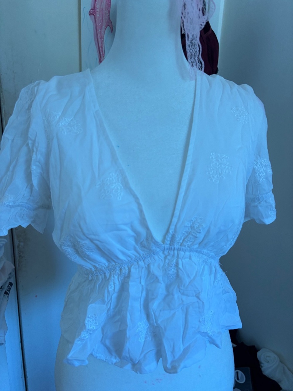 For Sale: Forever 21 Embroidered Eyelet Peplum Top Price: $12